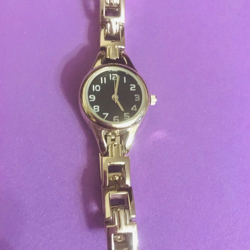 Black Face Ladies Silver Tone Watch With SilverTone Bracelet